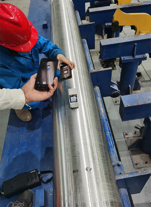 Maxton engineers inspecting billet surface quality after peeling during commissioning in Iran.